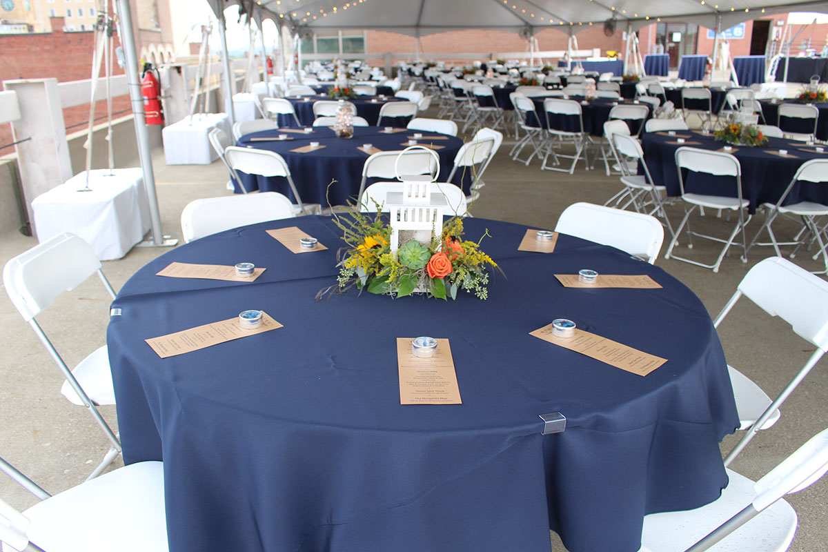 90" Round Navy Solid Tablecover On A 60" Round Table